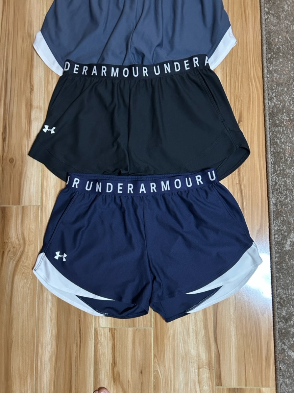 Under Armour Women's 4-Pack Athletic Shorts - Black, Navy, Gray, Charcoal - Picture 3 of 4